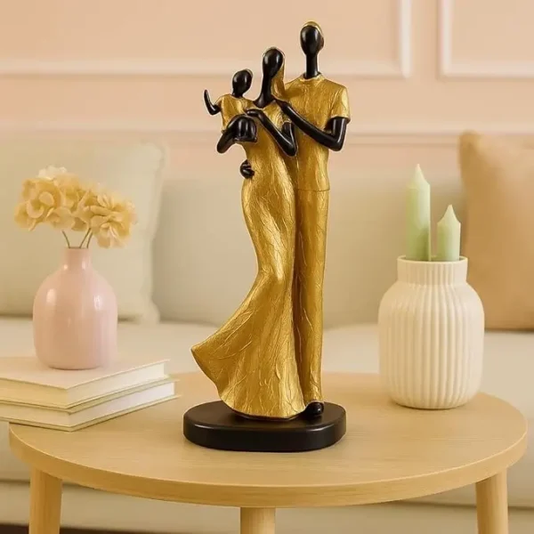 Xtore Stylish Golden Black Resin Couple Statue with Child for Home Decor
