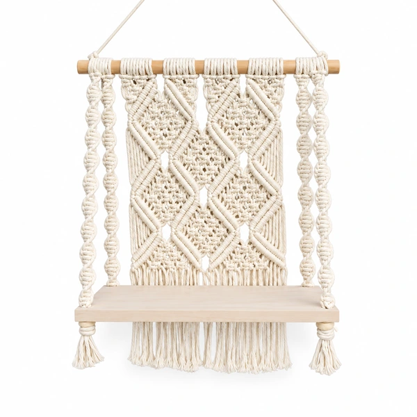 SPT Crafts white cotton macrame wall shelf with wooden platform on a white background