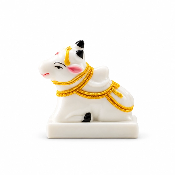 SriMaa Ventures white Nandi figurine with gold and red accents, studio view