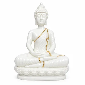 Sukoon white meditating Buddha statue with gold accents, studio view