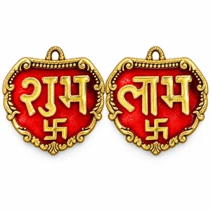 Pair of red and gold metal Shubh Labh door-hanging plaques on white