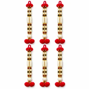 Set of six white artificial-pearl deity malas with gold spacers and red ends