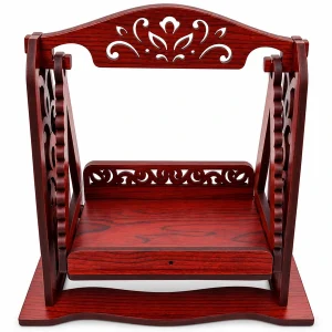 Empty red wooden Laddu Gopal singhasan seat with carved frame on white