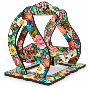 Empty floral wooden Laddu Gopal jhula with colourful printed frame on white