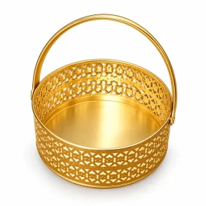 Empty gold-tone metal puja flower basket with open lattice sides and a slim arched handle on white