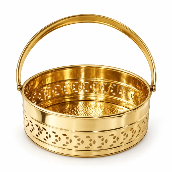 Empty round brass puja basket with arched handle and pierced decorative side band on white