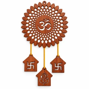 Brown wooden Om wall hanging with floral cutwork, yellow cords and three house-shaped pendants on white