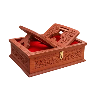 Brown carved wooden Quran storage box with integrated rehal and red interior