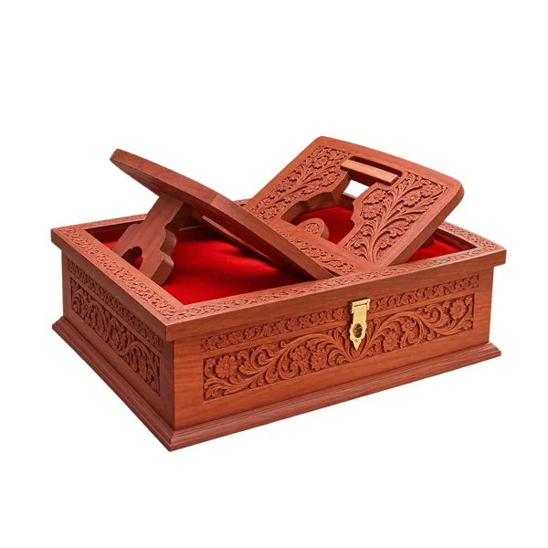Brown carved wooden Quran storage box with integrated rehal and red interior