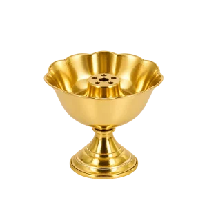Golden brass pedestal incense holder with scalloped ash-catching bowl on a transparent background