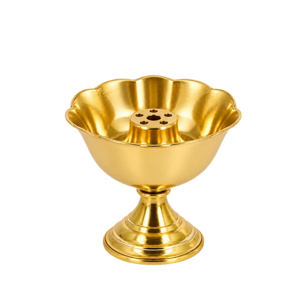 Golden brass pedestal incense holder with scalloped ash-catching bowl on a transparent background