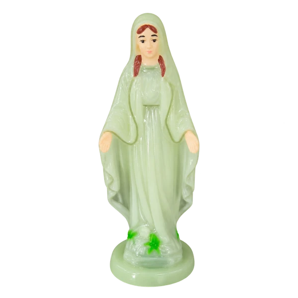 Pale green Virgin Mary figurine on a round base on a transparent background