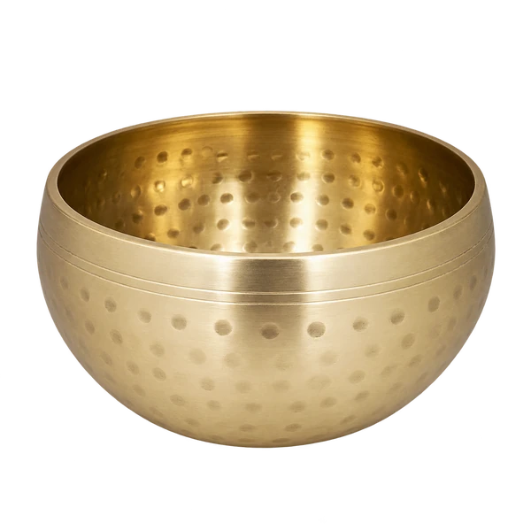 Empty hammered brass singing bowl on a transparent background