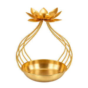 Gold tone floral metal urli bowl with lotus tealight holder on a transparent background