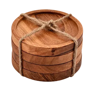 Four round acacia wood drink coasters tied with jute string on a transparent background